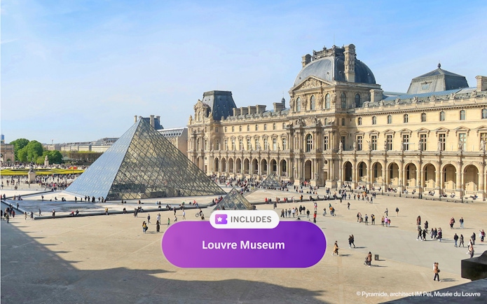Louvre Museum courtyard with glass pyramid in Paris.