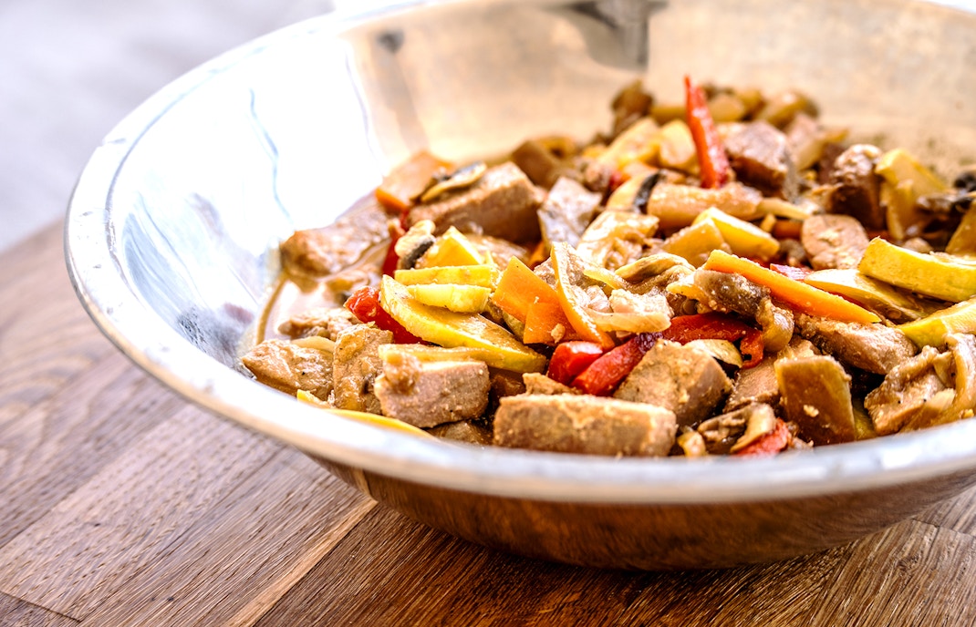 Mallorcan dishes on a table in Mallorca, showcasing local cuisine for a day tour.