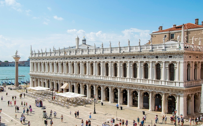 Doge's Palace in Venice with tourists in the courtyard, part of the Venice Museums Pass.