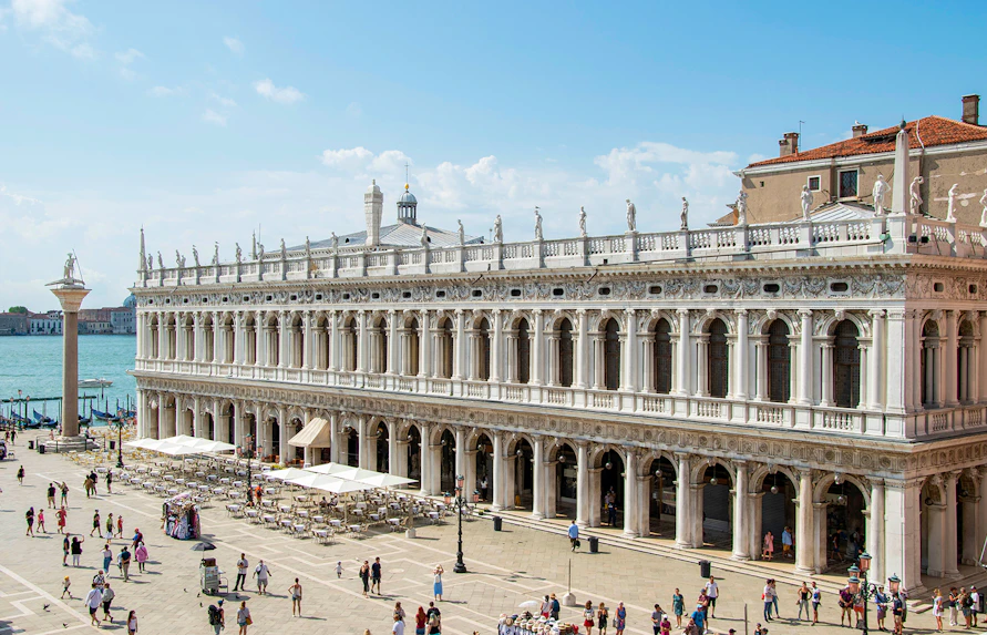 Doge's Palace in Venice with tourists in the courtyard, part of the Venice Museums Pass.