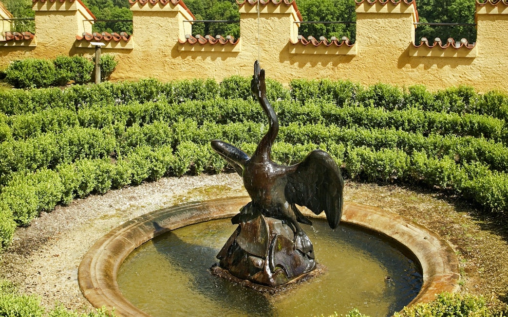 Swan fountain in garden at Hohenschwangau Castle, Germany.