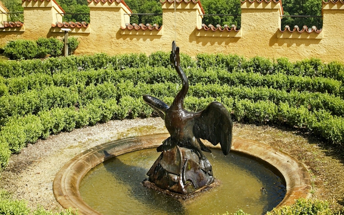 Swan fountain in garden at Hohenschwangau Castle, Germany.