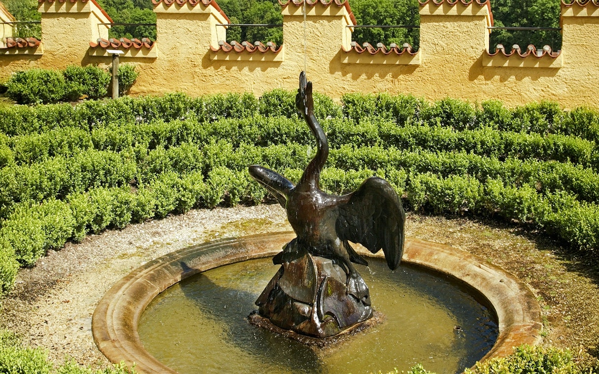 Swan fountain in garden at Hohenschwangau Castle, Germany.