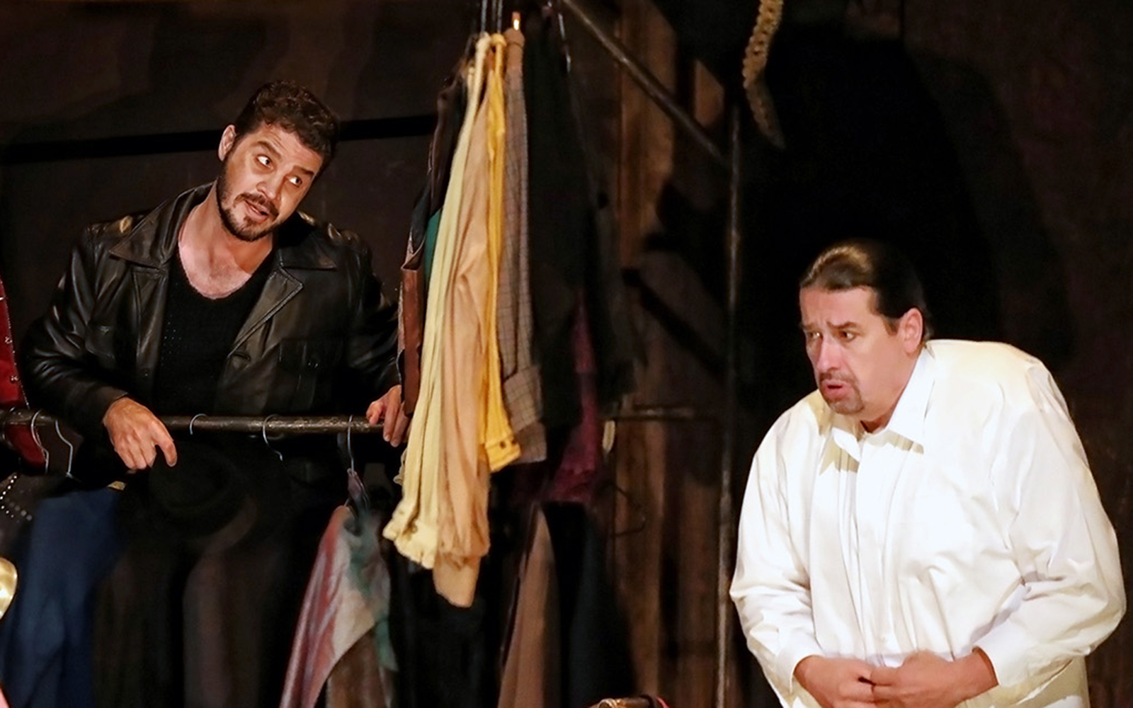 Actors performing in a scene from the Rigoletto show production.