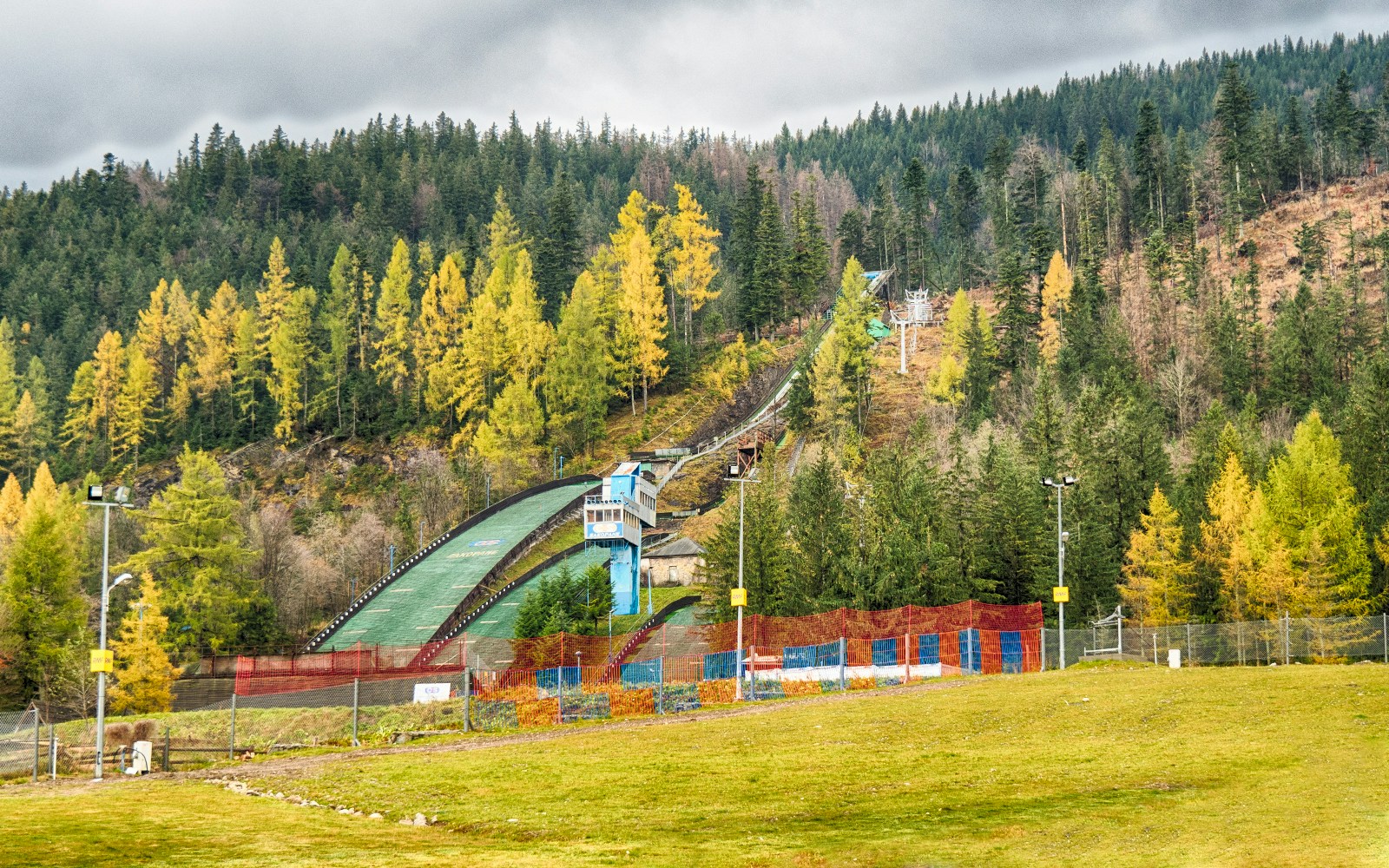 Wielka Krokiew ski jump surrounded by autumn trees in Zakopane, Poland.