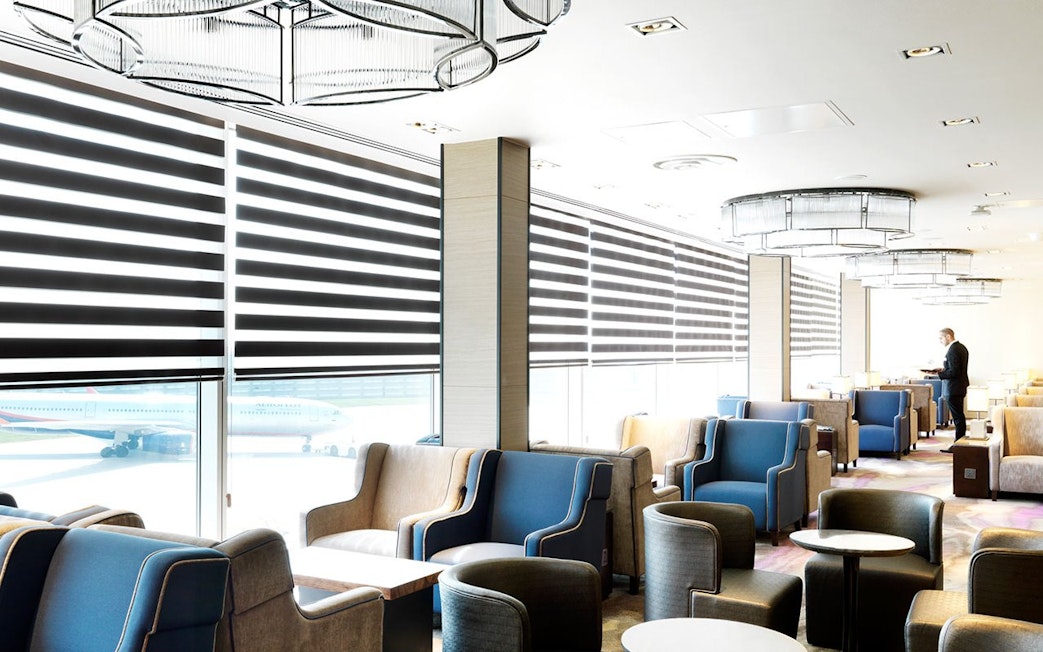 Plaza Premium Lounge seating area at Terminal 4, London Heathrow Airport.