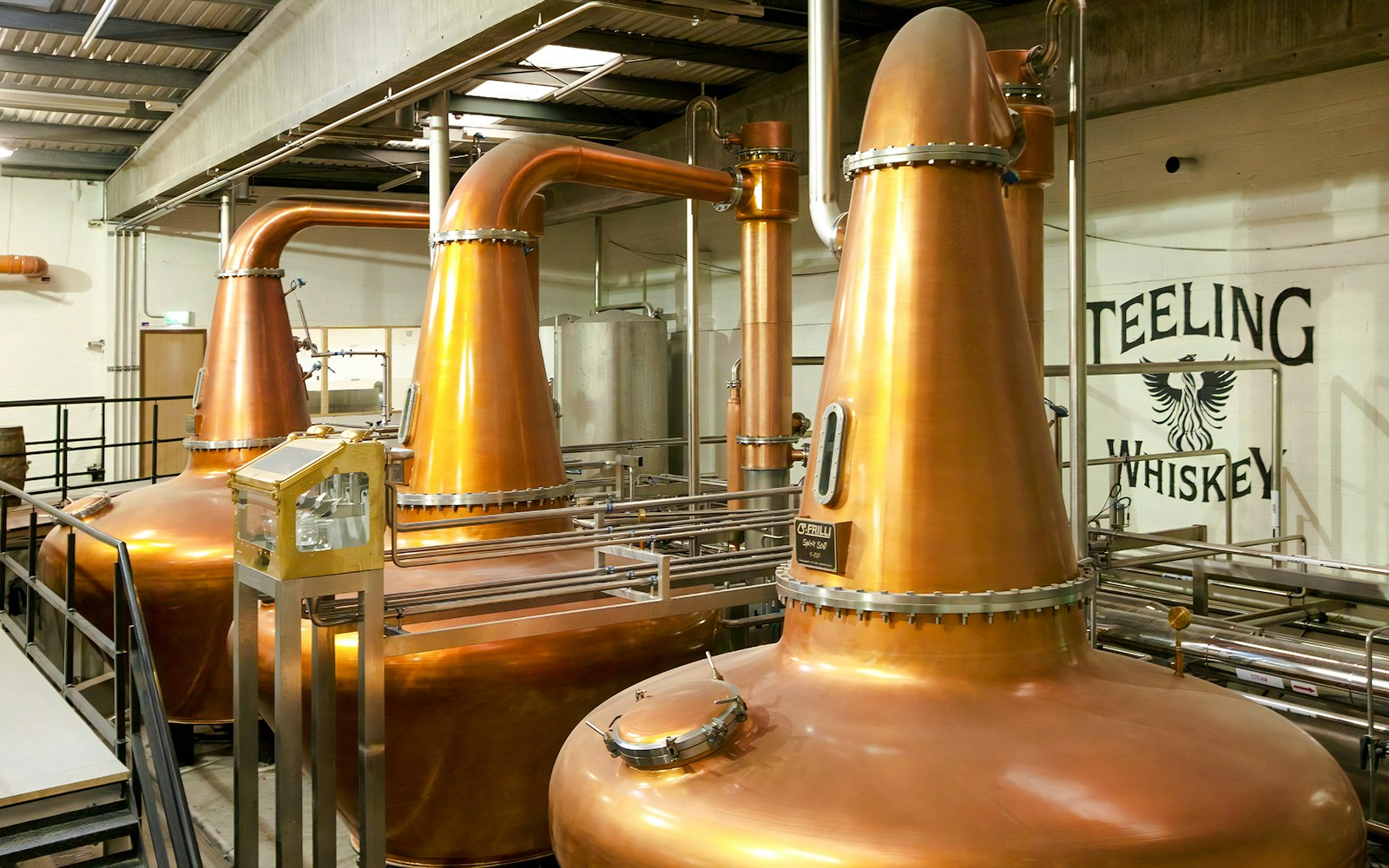 Copper pot stills inside Teeling Whiskey Distillery, Dublin.