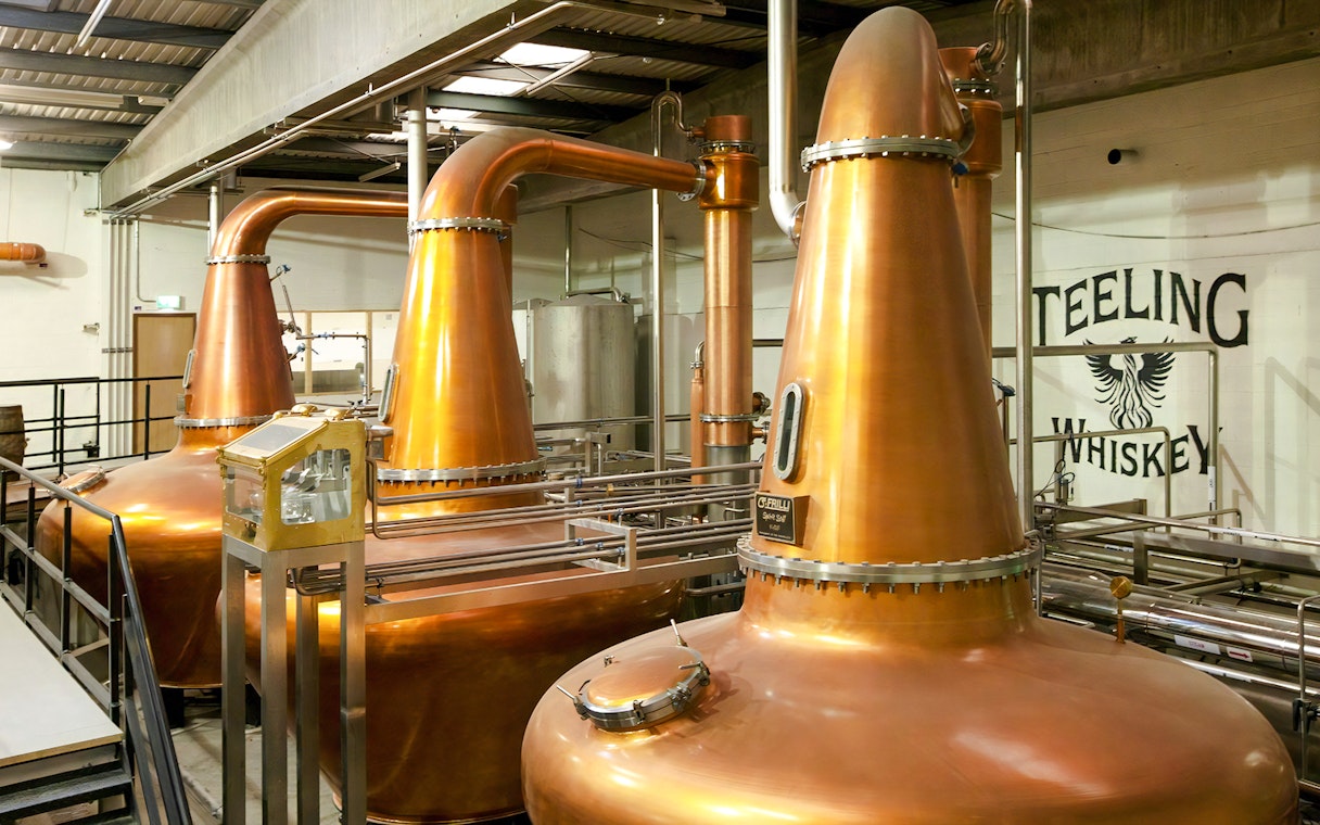 Copper pot stills inside Teeling Whiskey Distillery, Dublin.