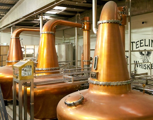 Copper pot stills inside Teeling Whiskey Distillery, Dublin.