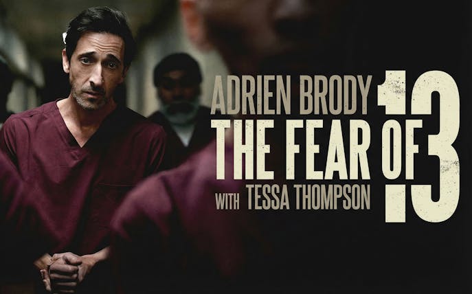 The Fear of 13 Broadway poster with actors in maroon attire.