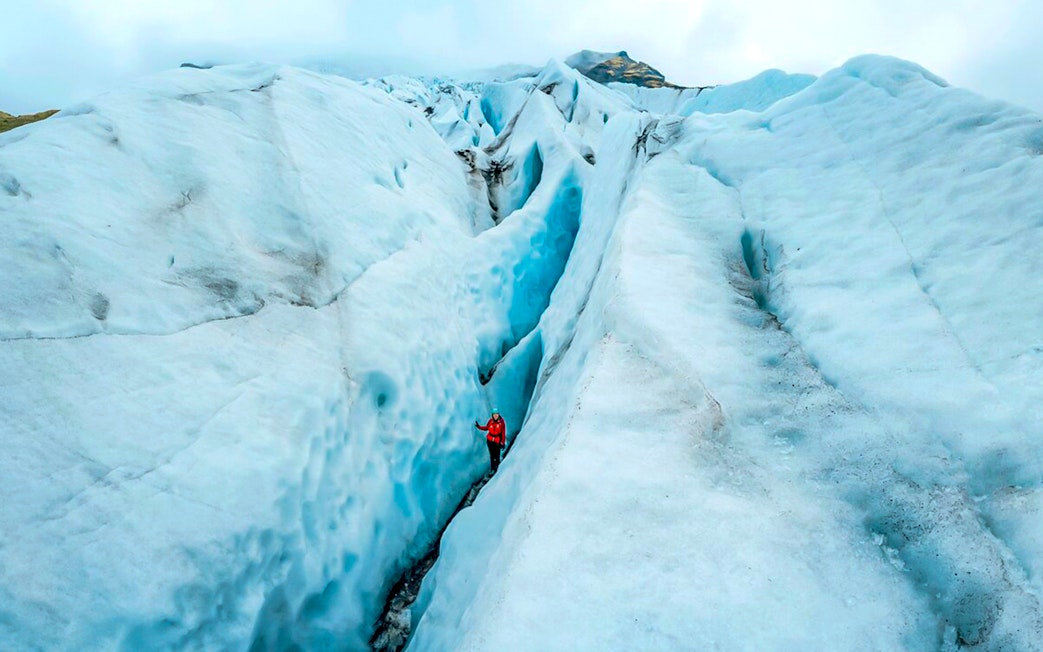 Guests navigating ice maze and glacier crevasses in Skaftafell, Iceland.