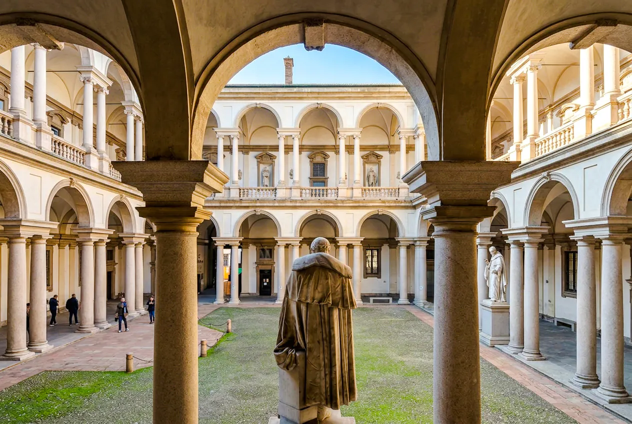 Brera Gallery courtyard with arches and statues, Milan.