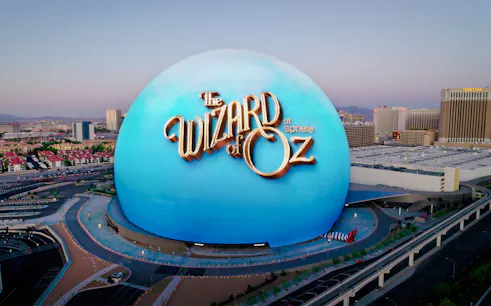 Wizard of Oz show at Sphere in Las Vegas with cityscape background.