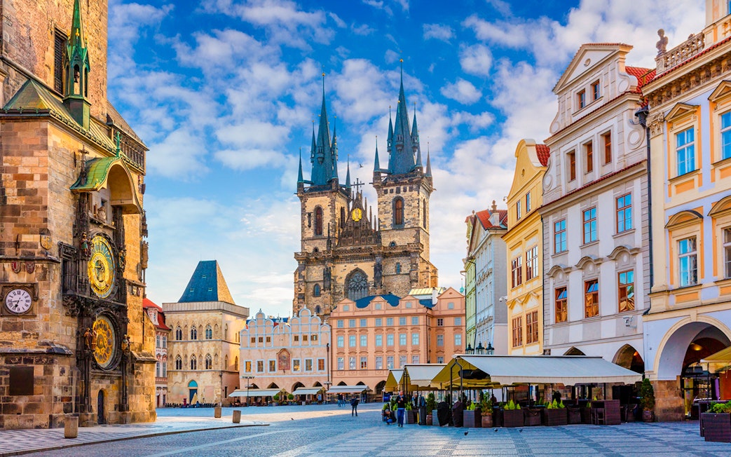 Prague Old Town Square with Astronomical Clock and Church of Our Lady before Týn.