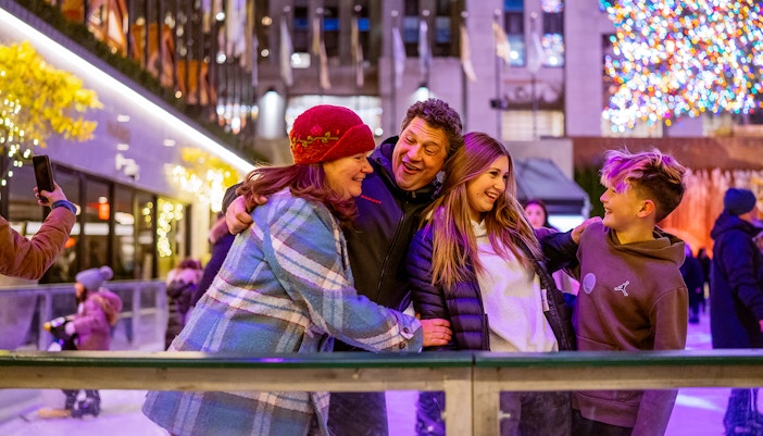 family seen near ice skating rink