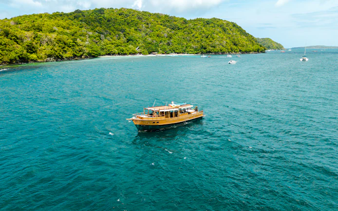 Phuket Private Longtail Boat Charter with Jacuzzi to Coral Island Banana Beach and Promthep Cape