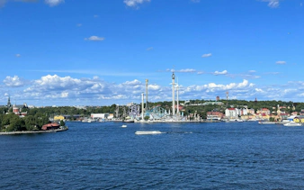 Stockholm waterfront view with Gröna Lund amusement park and Södermalm in the background.