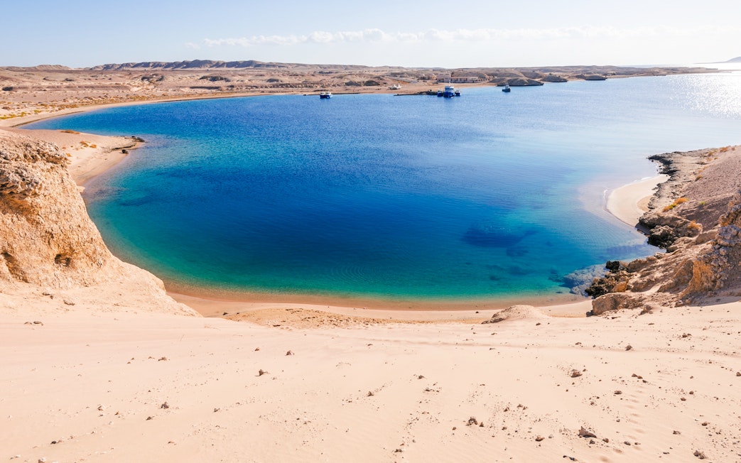 Ras Muhammad National Park's coastal view with clear blue waters and sandy shores, Egypt.