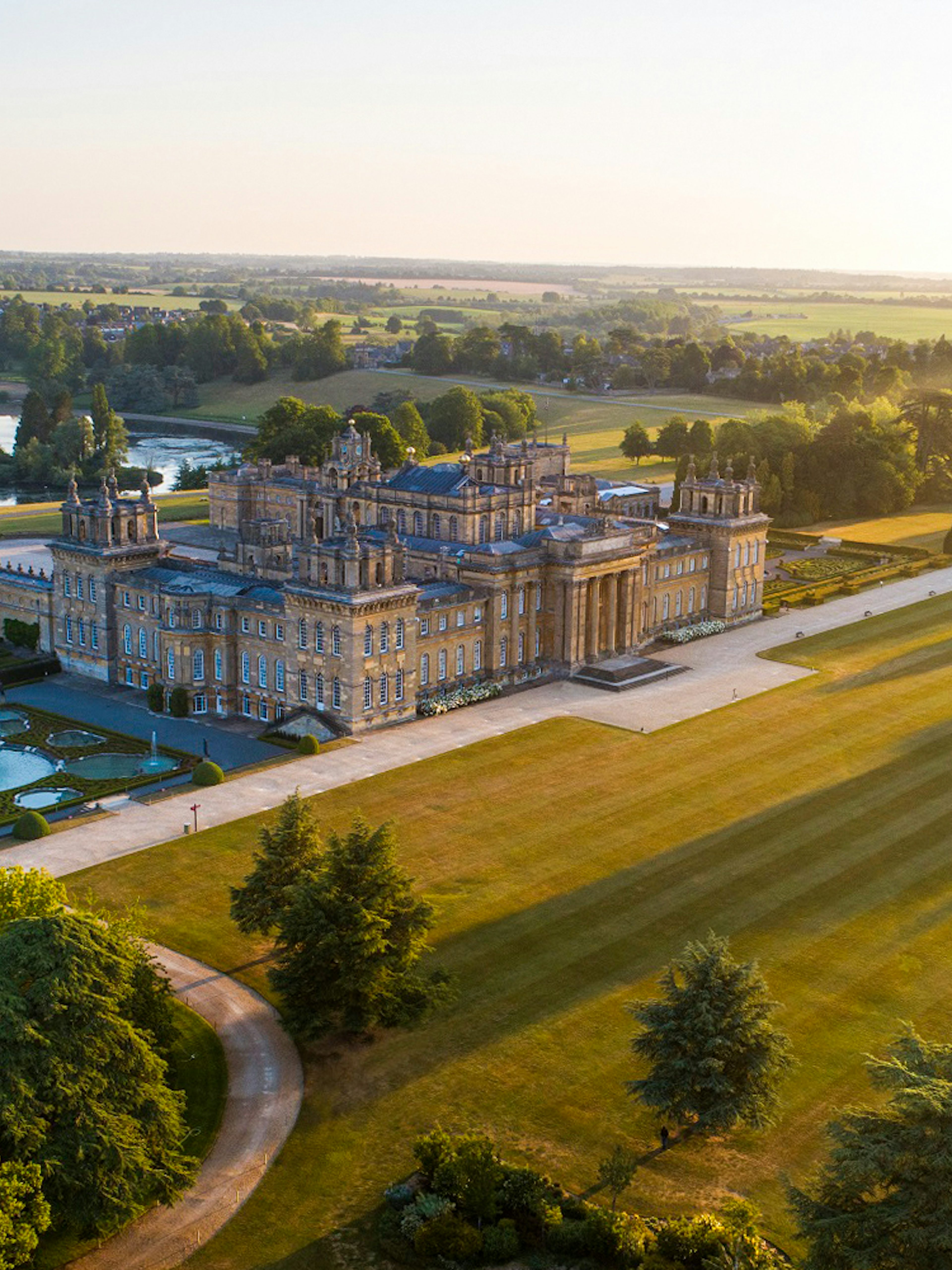 Blenheim Palace aerial view with gardens and surrounding landscape.