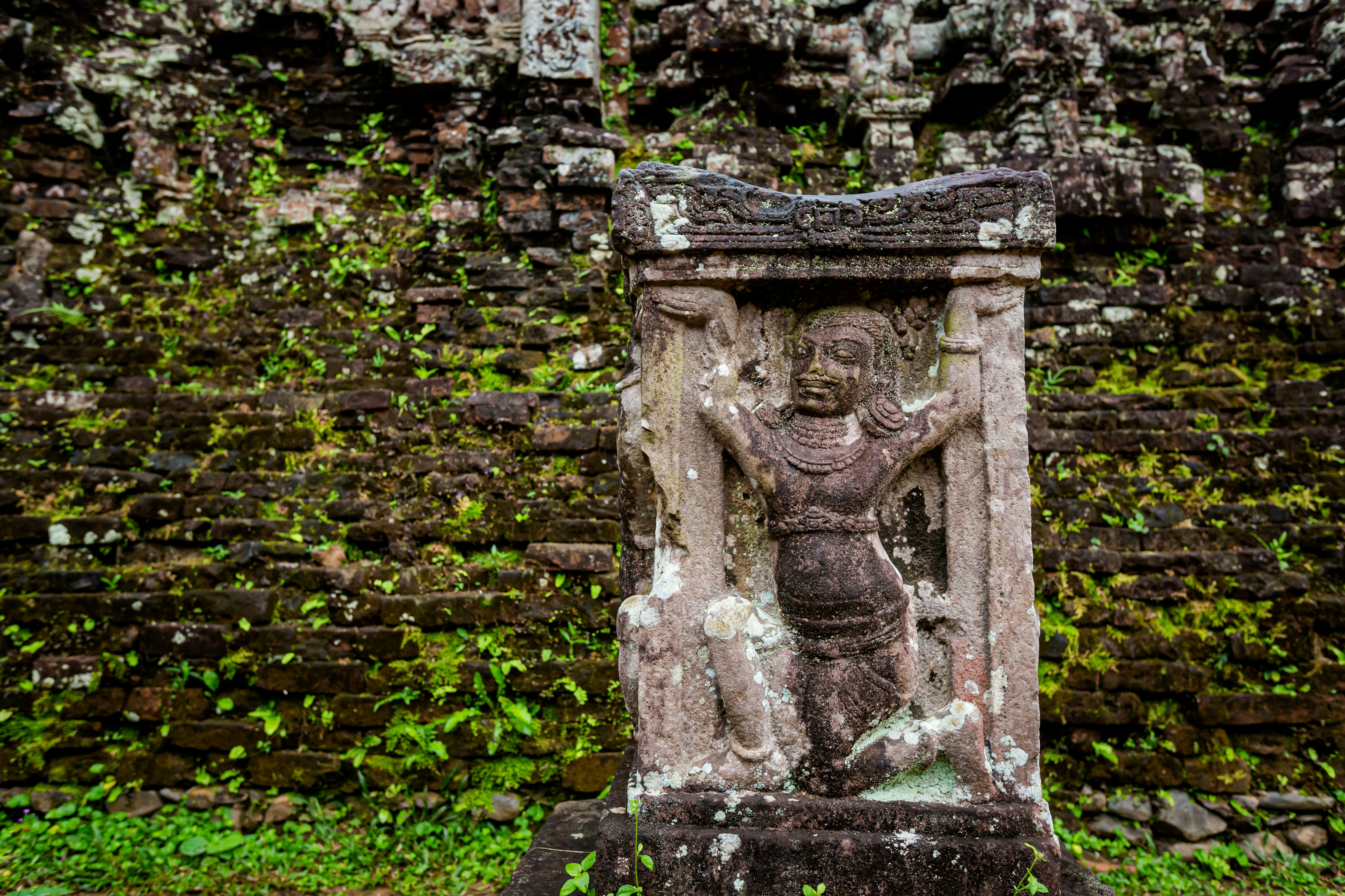 Dancing lady carved in stone at My Son Sanctuary, Hoi An, Vietnam.
