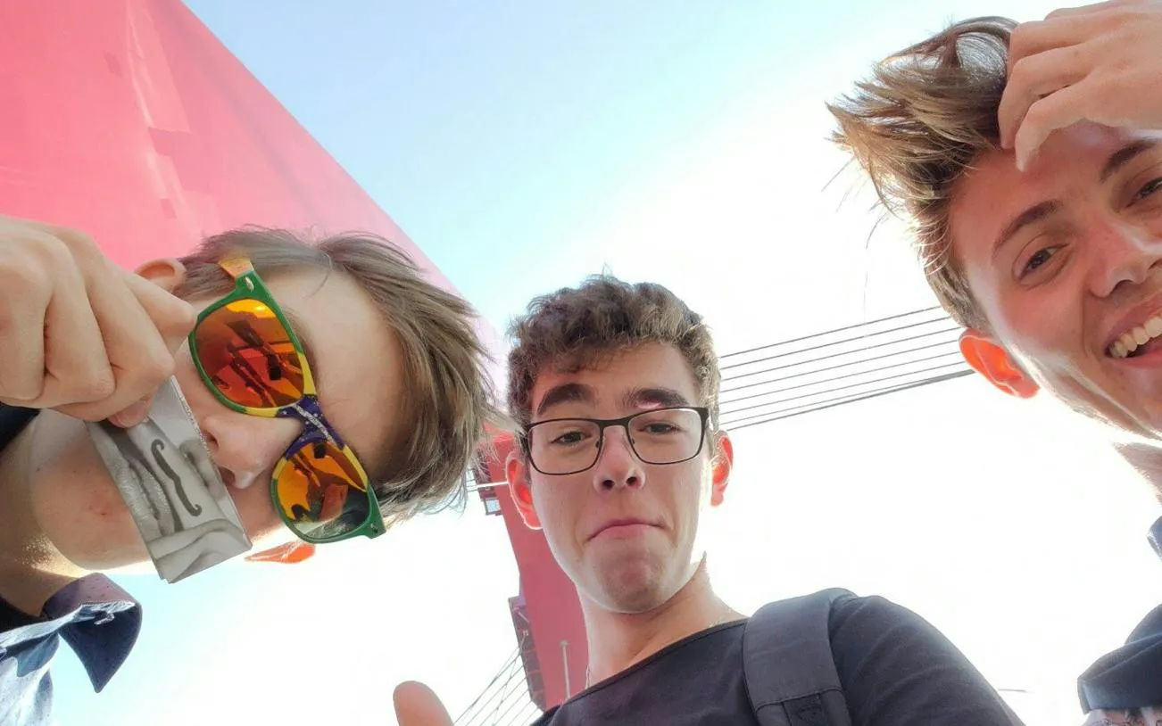 Three people enjoying the Rotterdam Modern Time Portal Travel self-guided city exploration game.