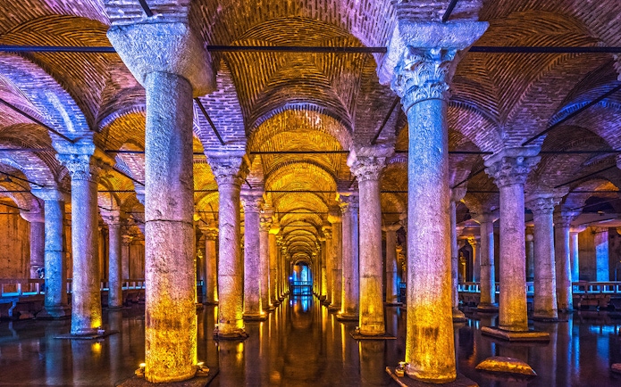 Basilica Cistern illuminated columns and arches, Istanbul guided tour.