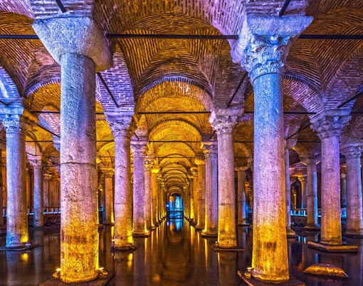 Basilica Cistern illuminated columns and arches, Istanbul guided tour.