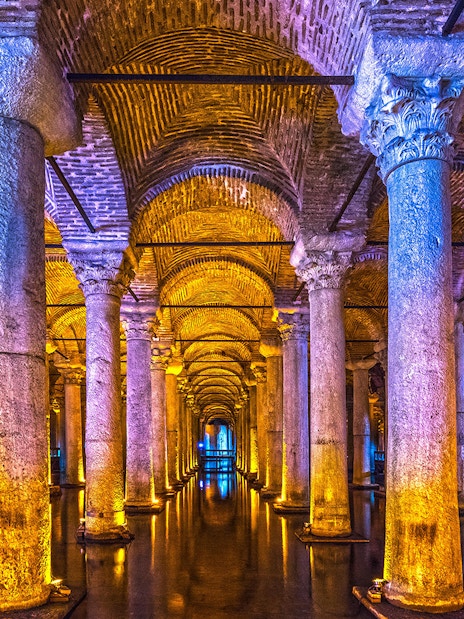 Basilica Cistern illuminated columns and arches, Istanbul guided tour.