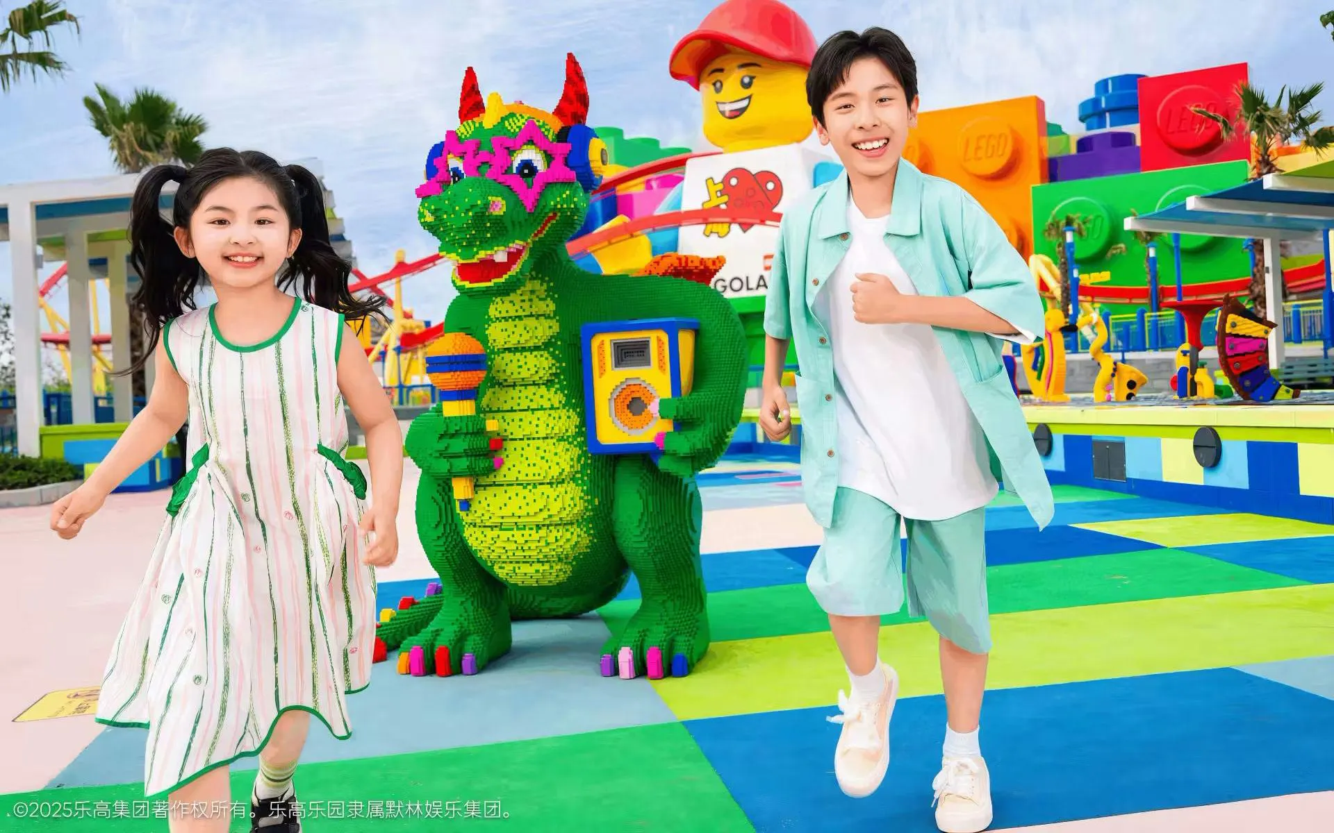 Kids enjoying colorful Lego dragon at Legoland Shanghai.