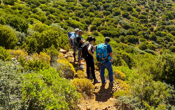 Trekking path along coastal cliffs from Masua to Cala Domestica, Sardinia.