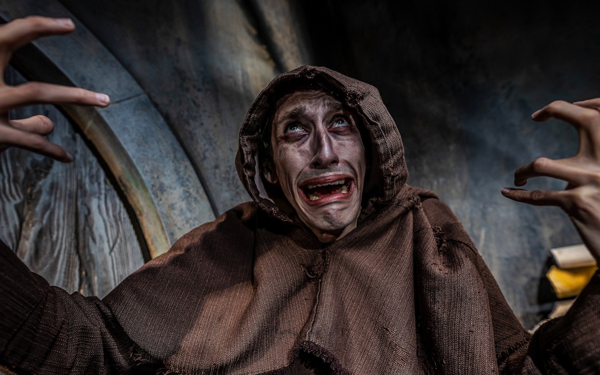 Actor in distress during Vengeance of the Vikings show at York Dungeon.
