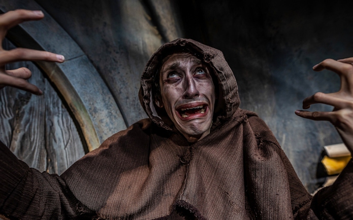 Actor in distress during Vengeance of the Vikings show at York Dungeon.