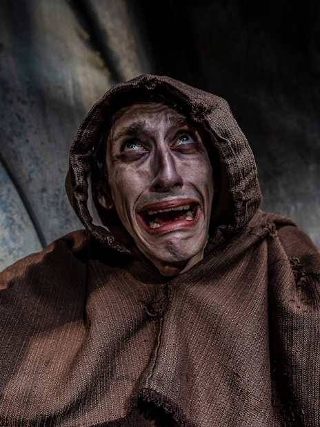 Actor in distress during Vengeance of the Vikings show at York Dungeon.