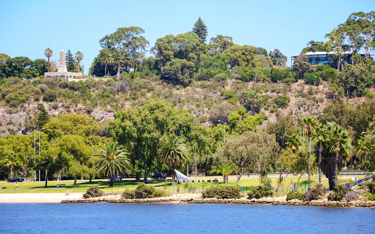Kings Park landscape with lush greenery and war memorial in Perth, Australia.