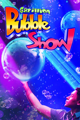 Gazillion Bubble Show performer creating large bubbles on stage in New York City.