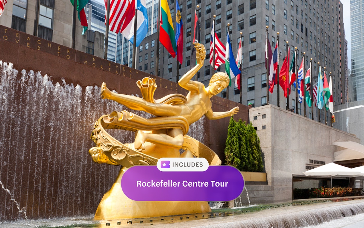 Prometheus statue at Rockefeller Center with international flags, New York Explorer Pass.