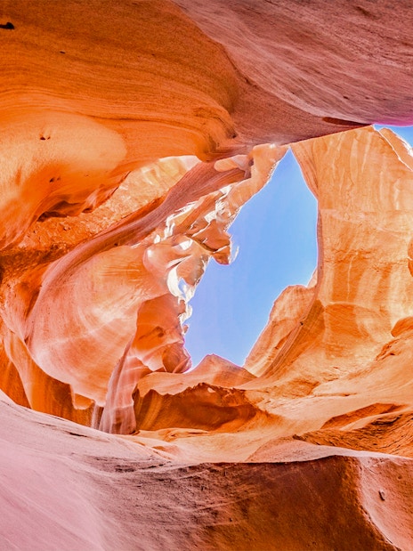 Antelope Valley Canyon rock formations with sunlight filtering through, Ligai Si Anii Tour.