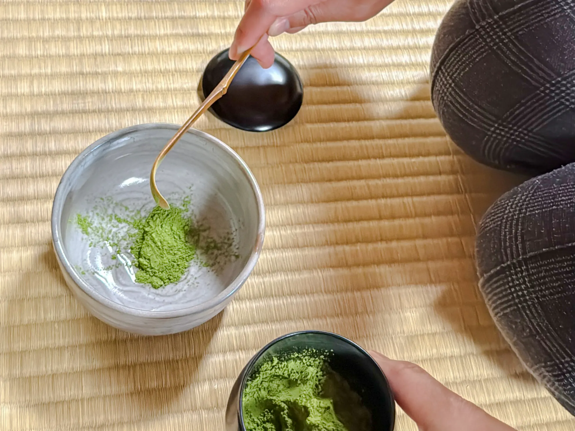 Green tea powder in a bowl during a tea ceremony at a cultural house in Hyogo.