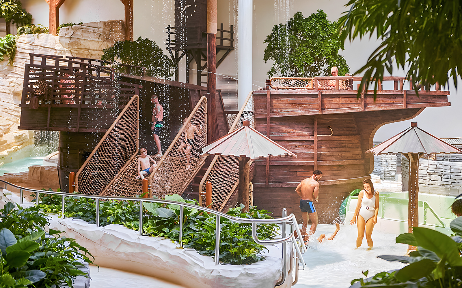 Bellewaerde Aquapark visitors enjoying water play area with wooden ship structure in Ypres.