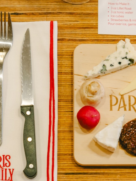 Cheese and charcuterie board at Emily in Paris tour, Paris, France.