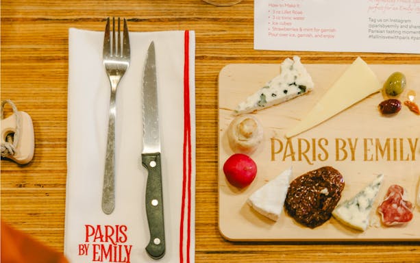 Cheese and charcuterie board at Emily in Paris tour, Paris, France.
