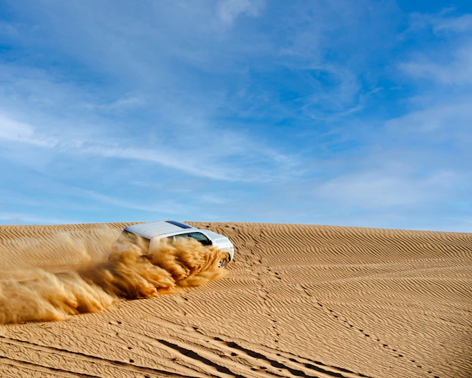 Dubai Evening Red Dunes Desert Safari with Quad Bike, Dune Bashing, Camel Ride, BBQ Dinner & Live Shows (Product 54352)