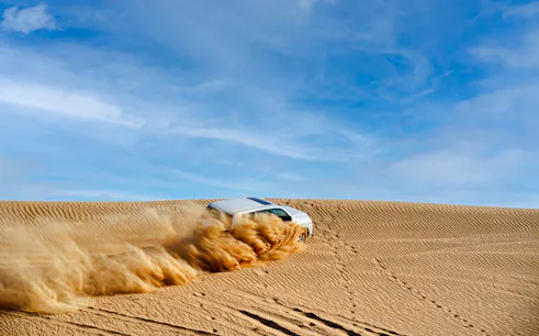 safari nocturno por el desierto de dubái con quad, paseo en camello y espectáculos en directo-1