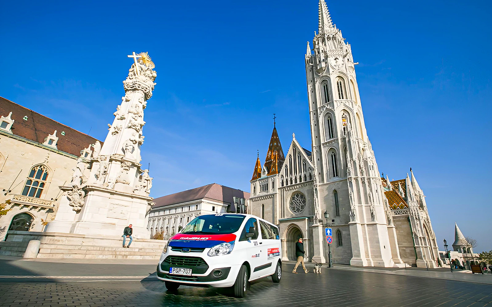 MiniBud Airport shuttle in front of Matthias Church, Budapest.