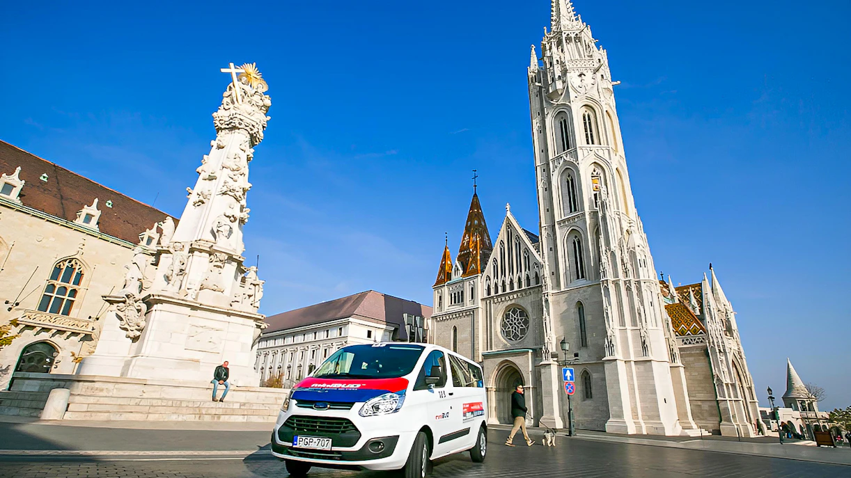 MiniBud Airport shuttle in front of Matthias Church, Budapest.