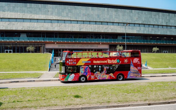 City Sightseeing Turin bus in front of Museo Nazionale dell'Automobile.