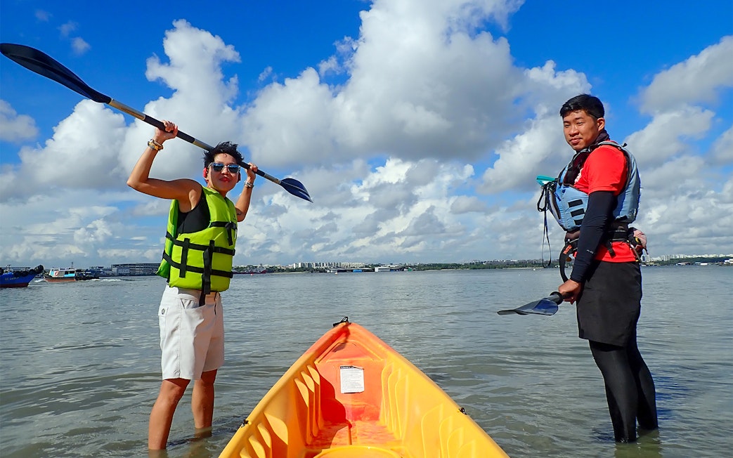 Kayaking in Singapore with Go City All-Inclusive Pass, featuring two people in life vests.