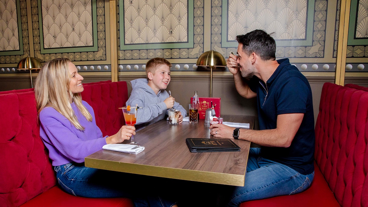 Monopoly Lifesized London dining table with themed food and beverages.