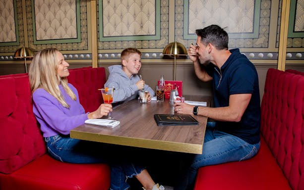 Monopoly Lifesized London dining table with themed food and beverages.