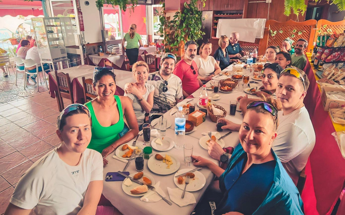 Tour group enjoying lunch during Red Canyon Tour.